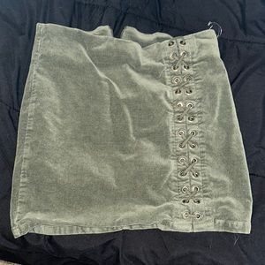 green mini skirt
